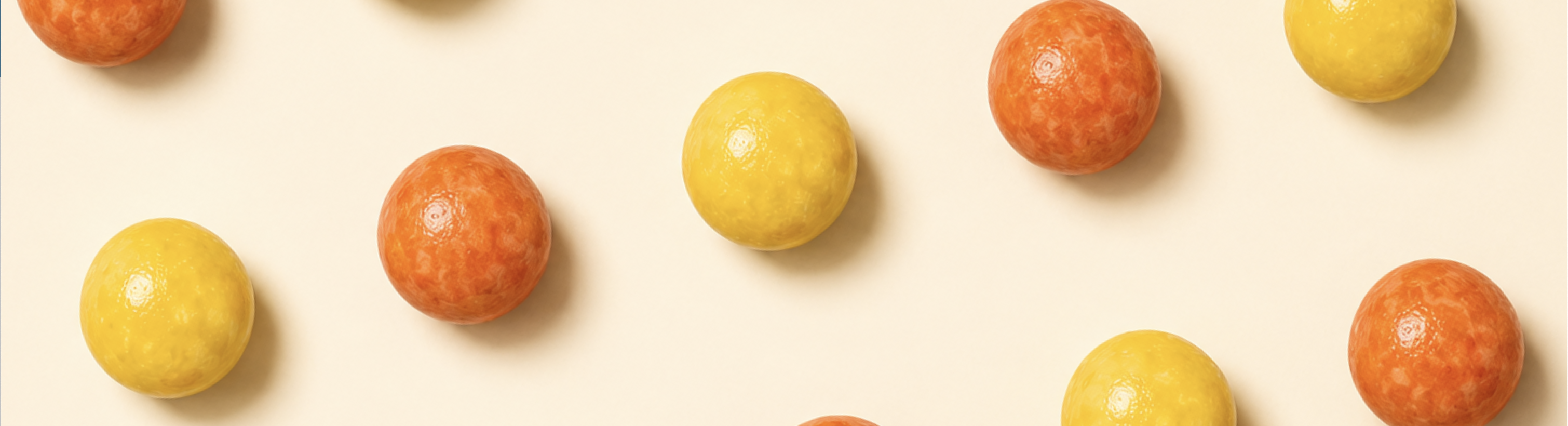 Soft chews arranged diagonally on a cream surface - Makson Healthcare nutraceutical soft chew manufacturing